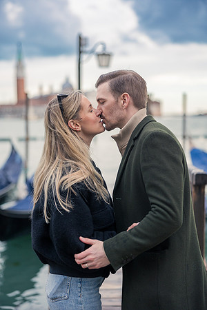 The couple's intertwined hands symbolize their journey together after the proposal.