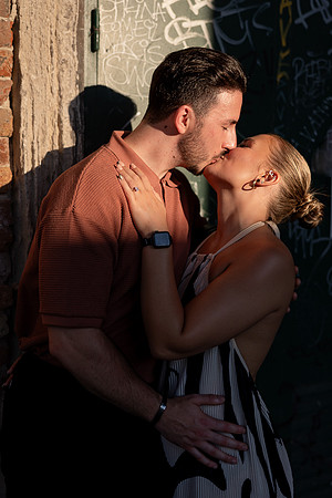 Kiss under Venetian sun after engagement