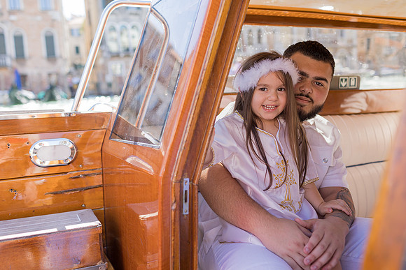 Mother child water taxi San Lazzaro christening