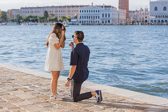 An intimate surprise proposal set against the stunning San Giorgio Maggiore.