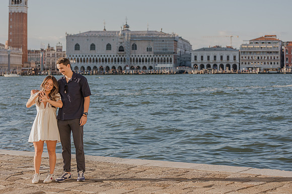 The joy of saying 'yes' captured in a breathtaking sunset engagement photo.
