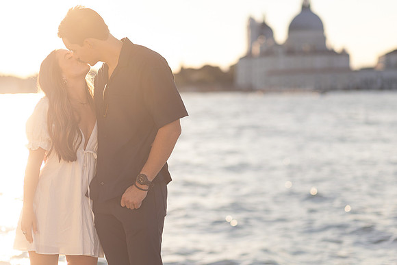 A Venice love story begins with a heartfelt proposal and a joyful embrace.