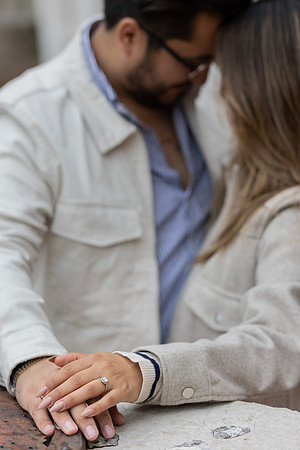 A close-up of their intertwined hands, symbolizing their new journey together.