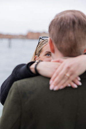An intimate portrait of the couple hugging, capturing the depth of their emotions.