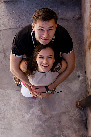 Overhead shot of a couple hugging in a historic Venetian location
