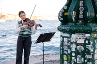 Violinist playing music for a proposal in Venice