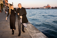 Couple at the edge of the water in Venice