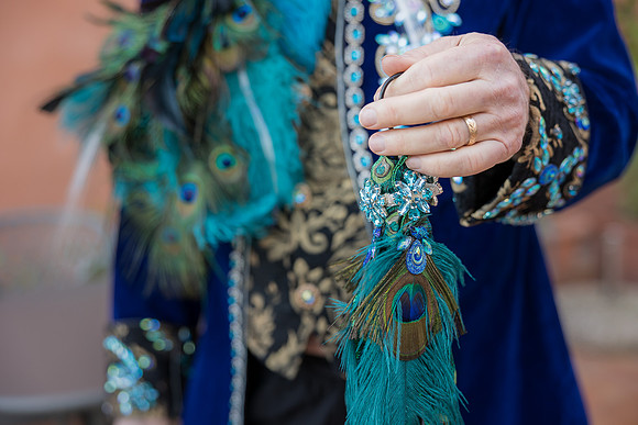 Close up detail of the intricate fabric and craftsmanship of custom Venetian costumes