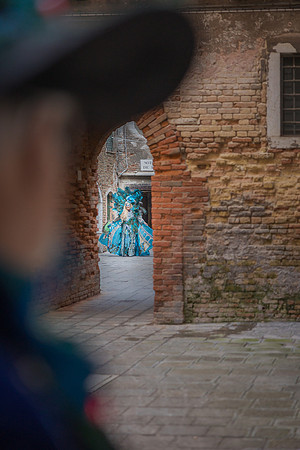 Blurred artistic shot of colorful carnival costumes in Venice