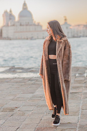 Thoughtful pose by the water in Venice