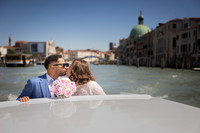 Couple on a water taxi in Venice