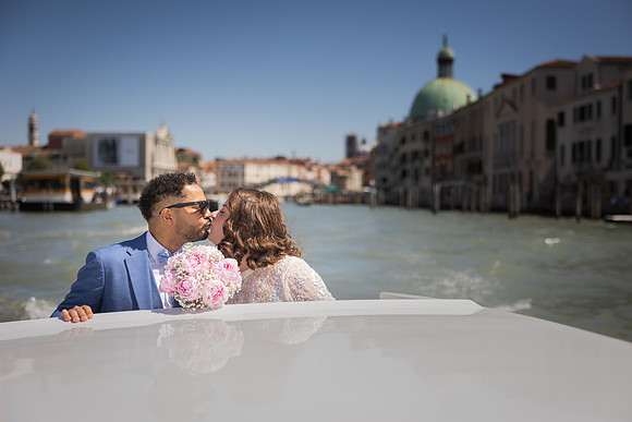 Couple on a water taxi in Venice