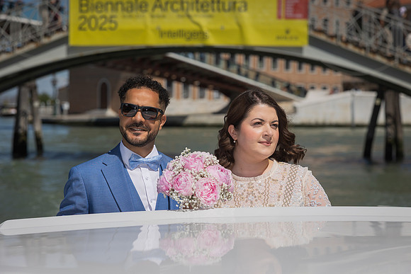 Couple arriving on a water taxi in Venice