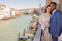 Couple embracing on a boat in Venice