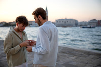 An intimate close up of a couple in Venice