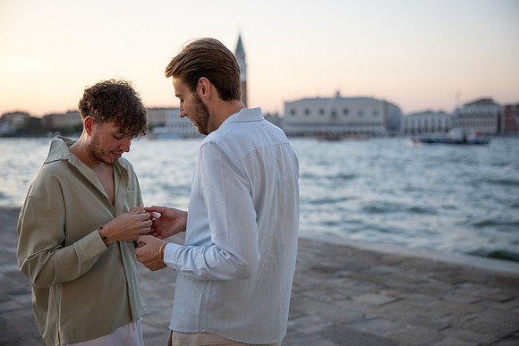 An intimate close up of a couple in Venice
