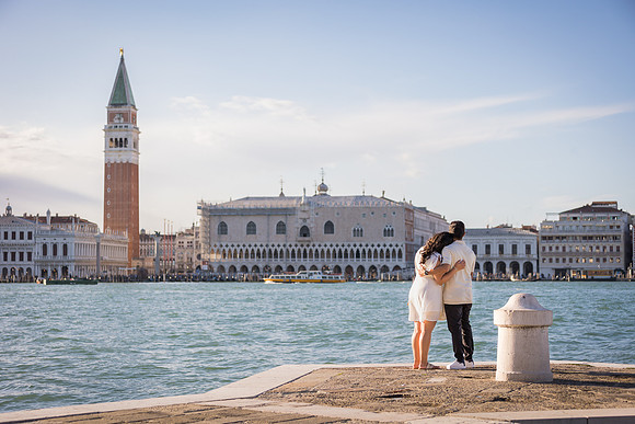 A couple celebrates their engagement with a breathtaking view of the Grand Canal.