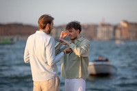 Silhouette of a couple during a sunset proposal in Venice