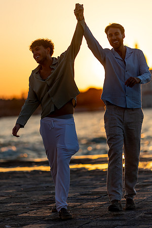 A joyful couple celebrating their proposal in Venice