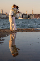 An intimate portrait of a couple at sunset in Venice