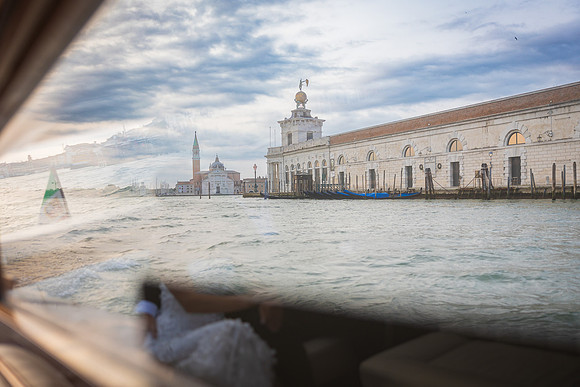 Sunrise kiss against Venetian domes - Anniversary sunrise photoshoot in Venice.