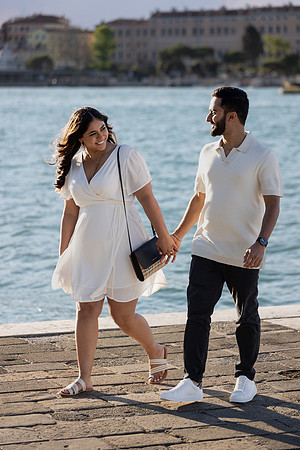 A newly engaged couple shares an intimate moment after a surprise proposal.