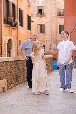 Family candid shot during a walk in Venice