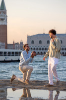 A romantic gay proposal at sunset on San Giorgio Island in Venice