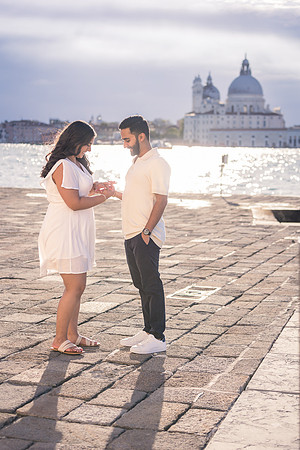 Holding hands after a heartfelt proposal in the floating city.