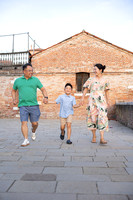 Family exploring Venice on a sunny day