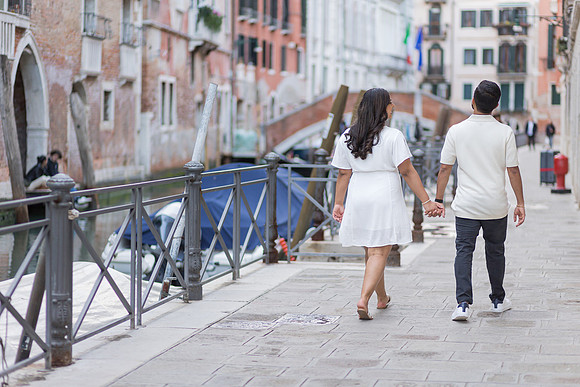 A romantic surprise proposal under the warm hues of the evening sky.