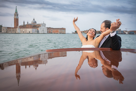Groom captured mid-thought with Salute Basilica behind - Anniversary sunrise photoshoot in Venice.