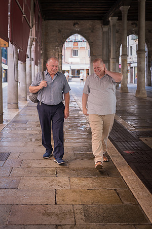 Family walking through Venice streets