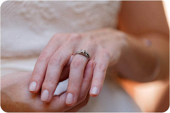 Close-up of a bride’s hand with a wedding ring in Venice.
