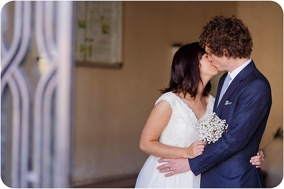 Bride and groom kissing after their wedding in Venice.
