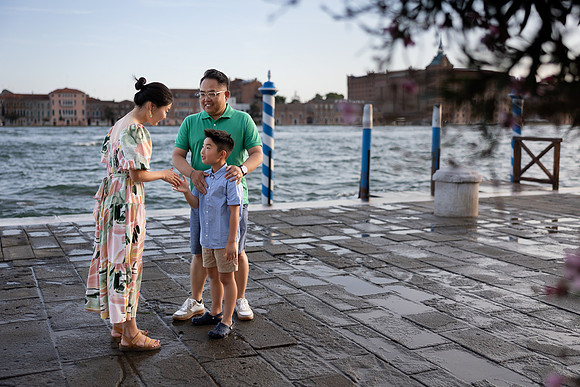 Family walking along the Venice waterfront