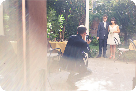Bride and groom sitting together, reflecting before their wedding.