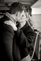 A joyful moment captured as the couple laughs together, soaking in the happiness of the day.