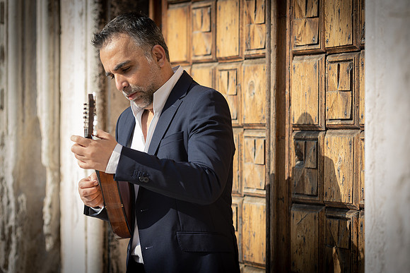 Close up of Jacob Reuben with his instrument