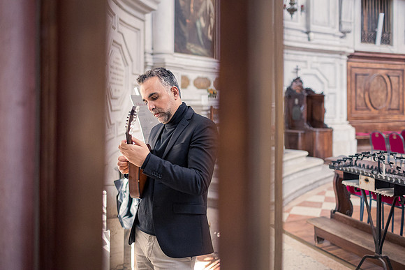 Portrait of a mandolin player in Venice