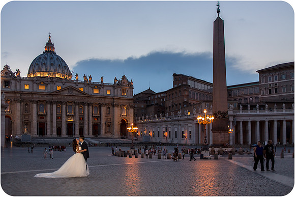 Bride in a wedding dress walking in a green park in Rome during her honeymoon.