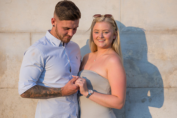 A newly engaged couple celebrates their love on the Grand Canal.