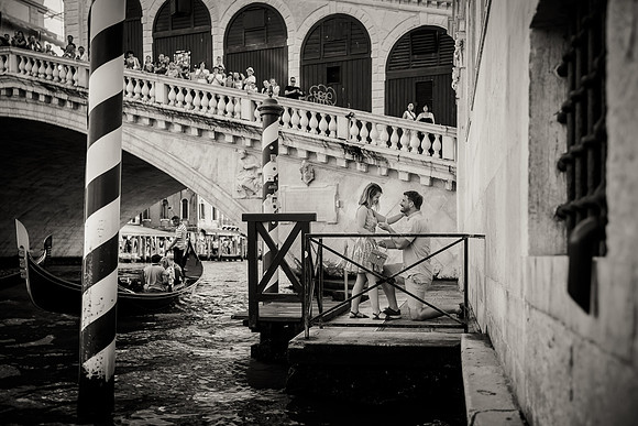 Engagement in black and white near Rialto Bridge