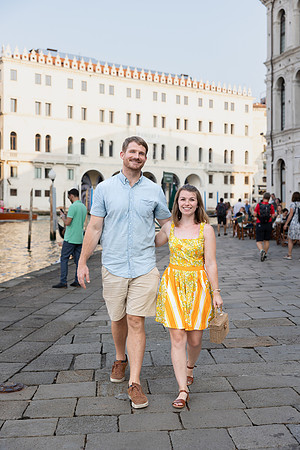 Couple walking together in Venice after their engagement