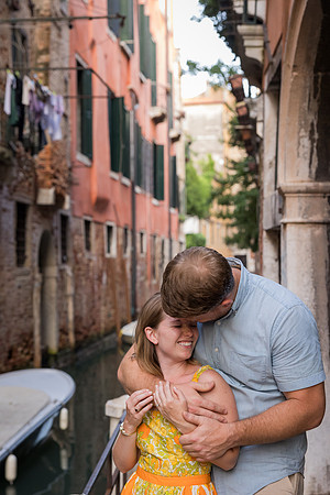 Couple hugging in a quiet Venetian alley