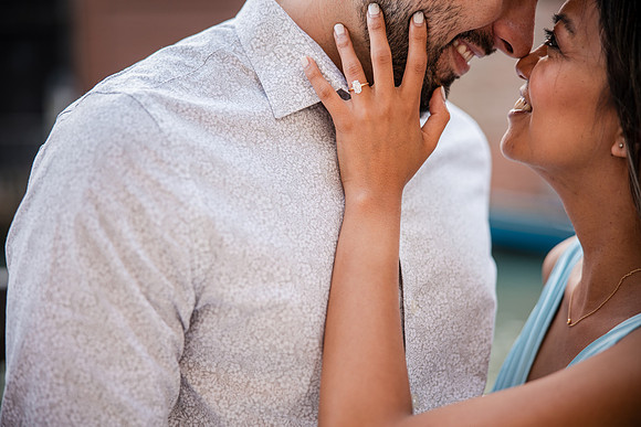 Engaged couple enjoying golden hour in Venice