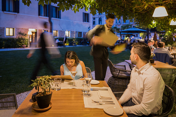 Elegant dining setup at Hotel Aman in Venice
