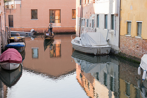 Close up of a couple embracing on a gondola