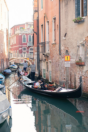 Couple laughing and celebrating on a gondola