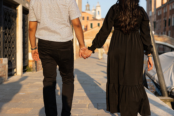 Couple looking into each others eyes in Venice